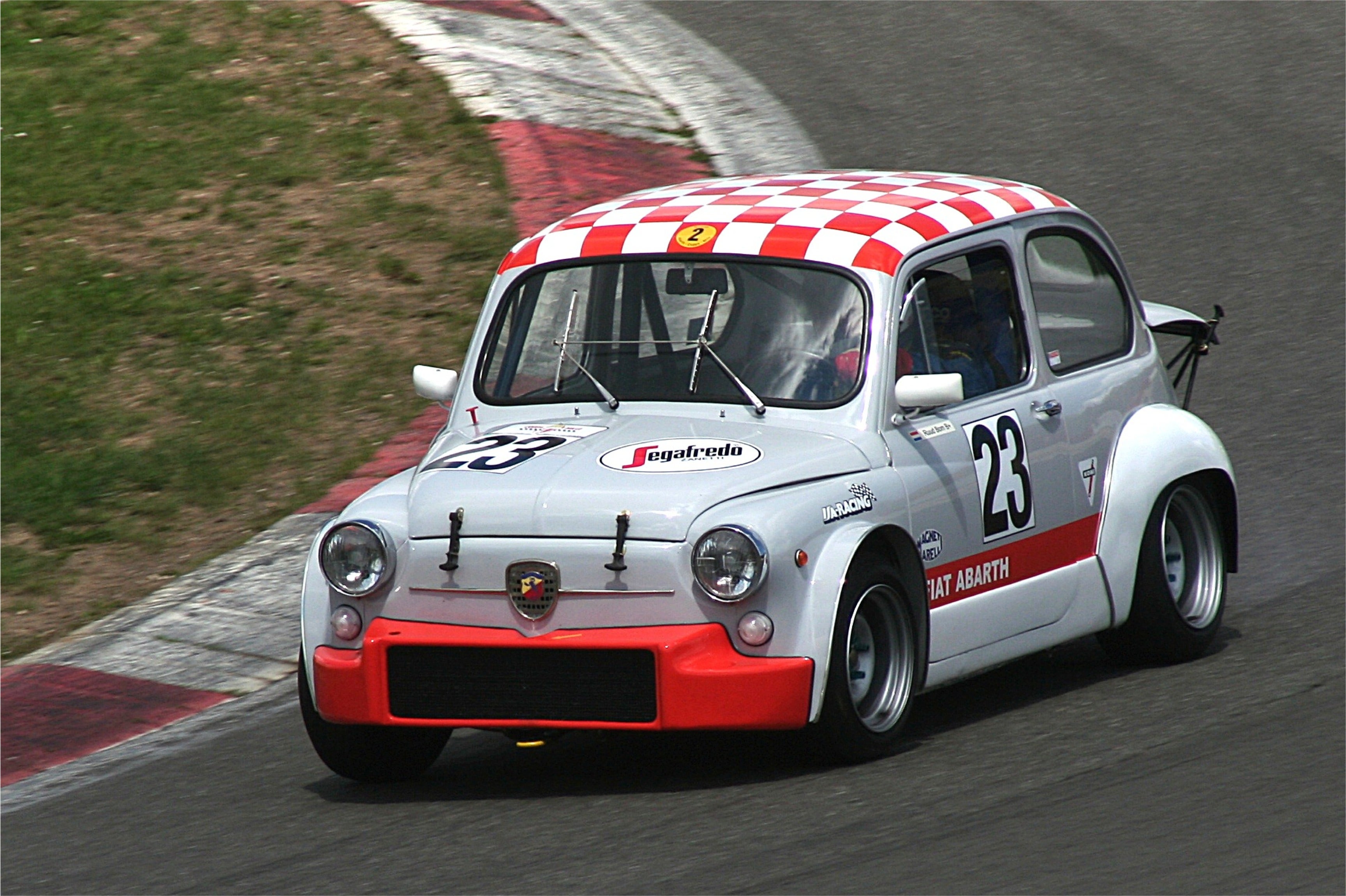 You know you've got a cool car when you have to race it with the engine half exposed! 